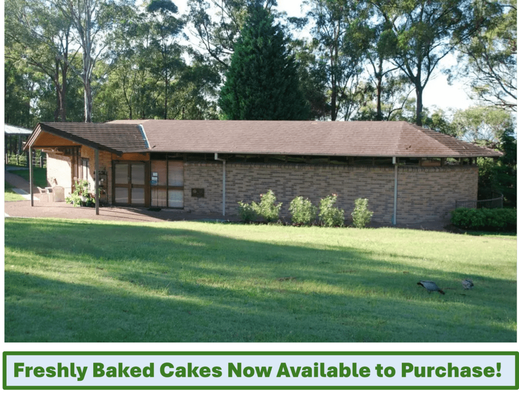 The Pilgrim Centre and Gift Shop at Mount Schoenstatt, with a sign for freshly baked cakes
